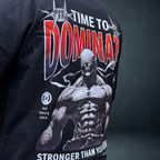 Side angle view of black DOMINATE oversized tee with bold warrior graphic - Prospera streetwear