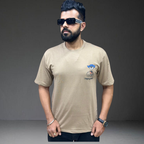 Dusty beige oversized t-shirt front view on man Prospera unisex