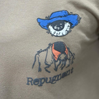 Front print graphic design detail dusty beige t-shirt Prospera