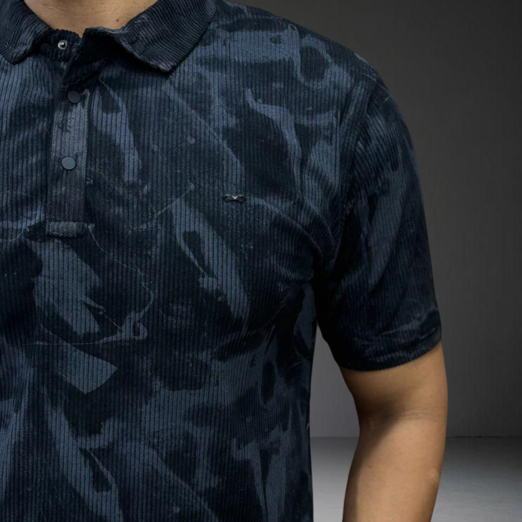 Black corduroy polo texture detail fabric pattern closeup