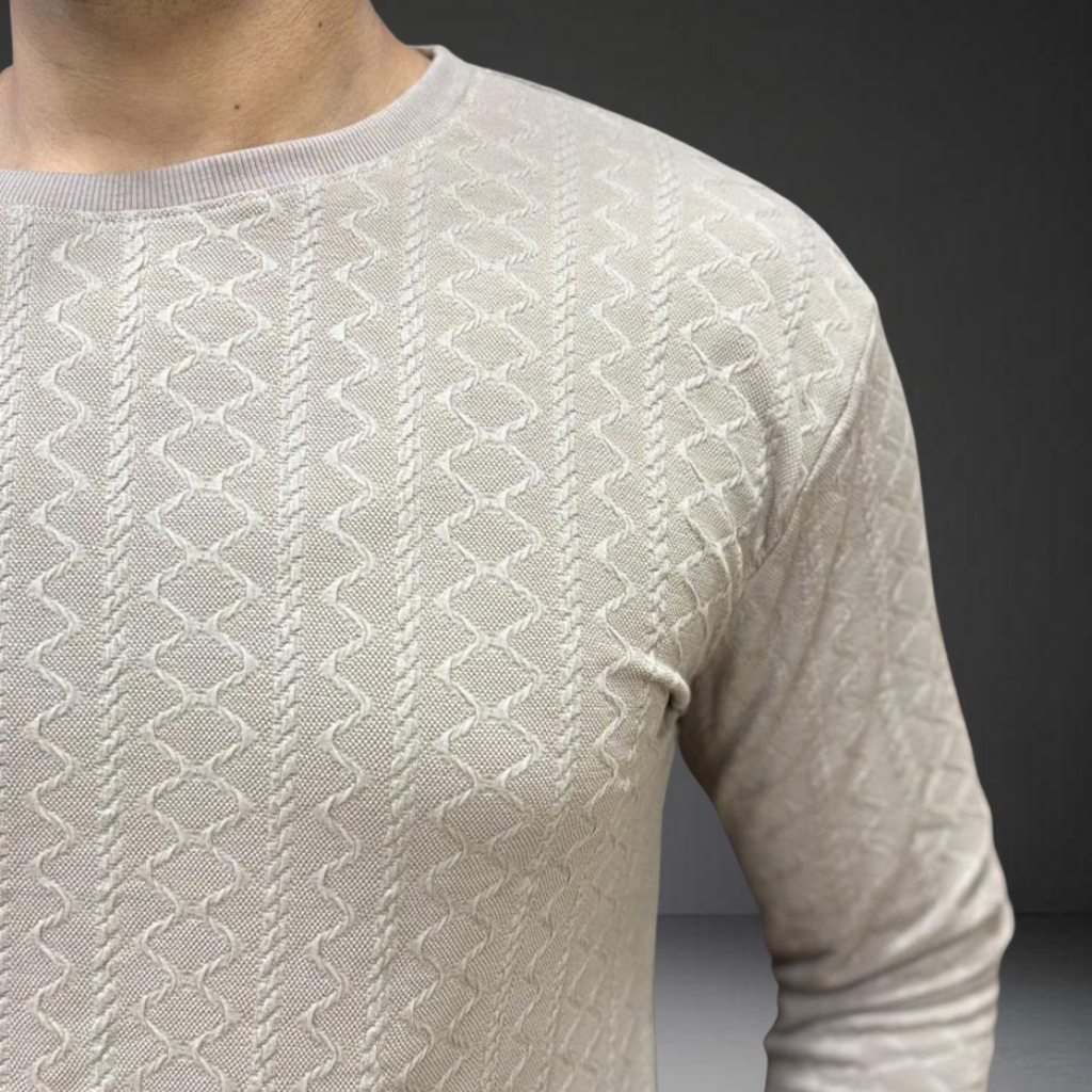 Cream textured knit fabric detail and pattern close-up