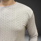 Cream textured knit fabric detail and pattern close-up