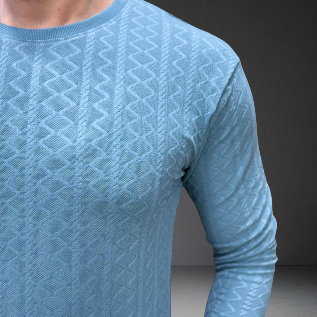 Powder blue textured knit t-shirt close-up detail - premium cotton fabric pattern