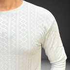 White textured knit t-shirt long sleeve detail - cotton fabric texture close up