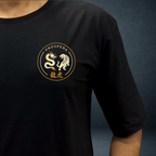 dragon vs tiger black unisex overiszed tshirt front close up logo