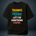 Black unisex oversized t-shirt front view with "Let's Do Something Stupid" friendship quote in retro colours