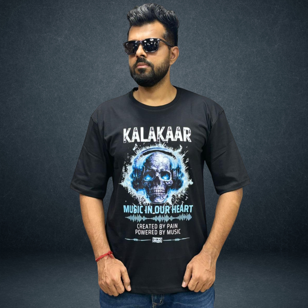 Men wearing Kalakaar black oversized graphic t-shirt - Prospera Clothing streetwear