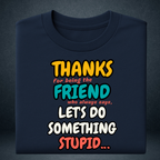 Navy blue oversized t-shirt folded, printed with funny friendship quote "Thanks for being the friend who always says let's do something stupid"
