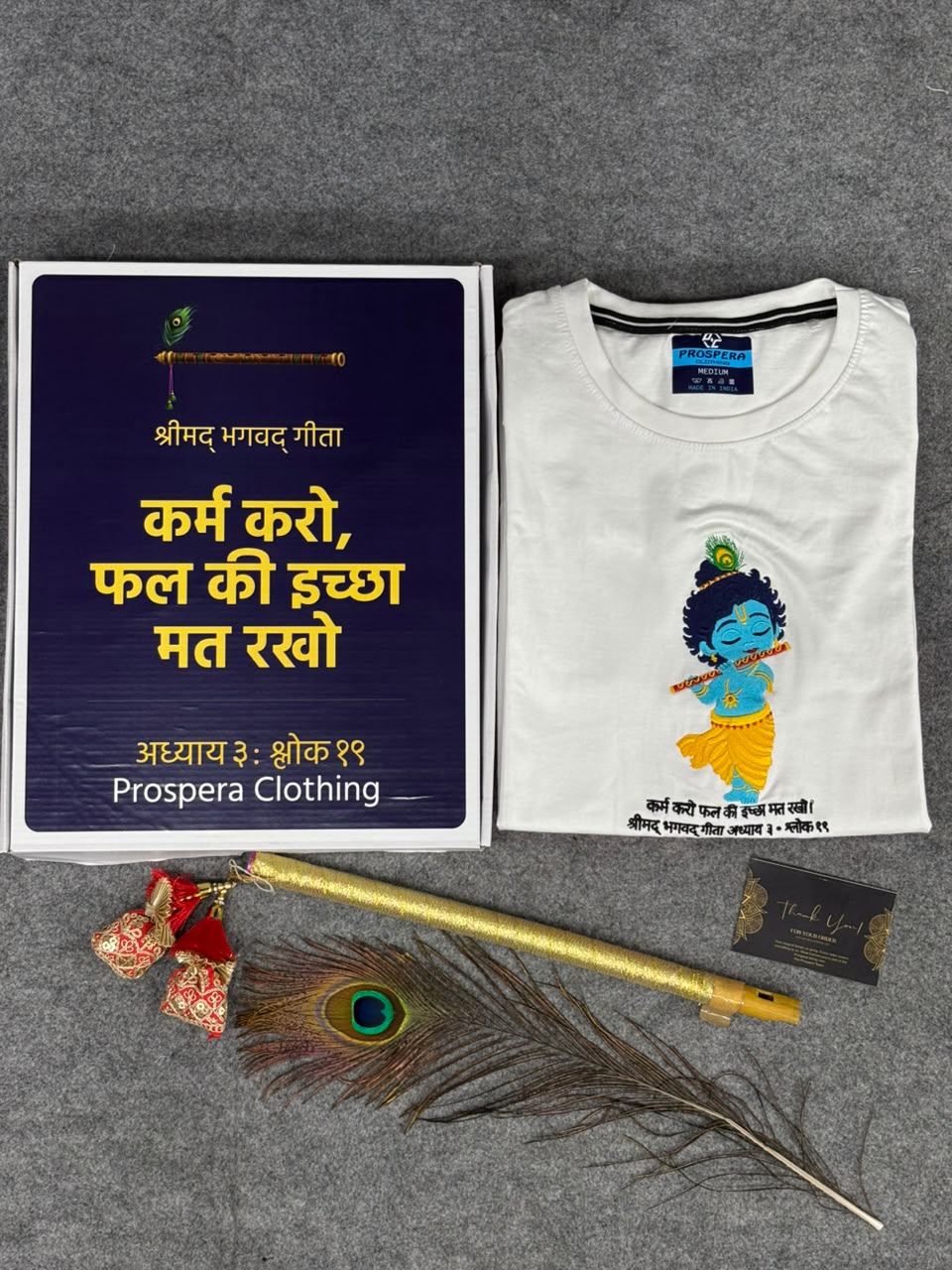 Packging of embroidery bal Krishna with flute and peacock feather on white cotton t-shirt with bagwadgita slok