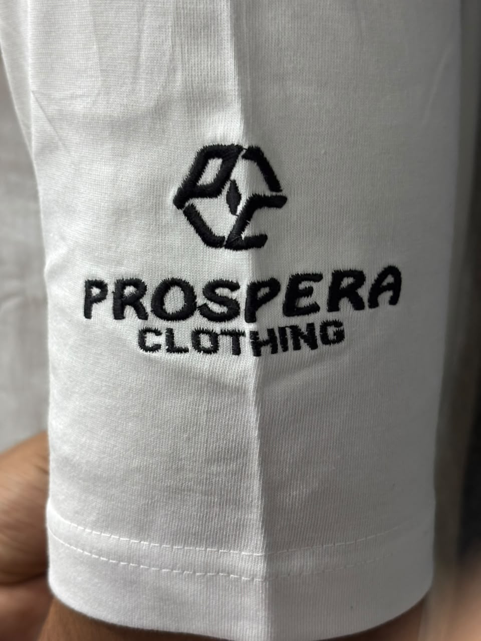 prospera embroidery sleeve  bal Krishna with flute and peacock feather on white cotton t-shirt with bagwadgita slok